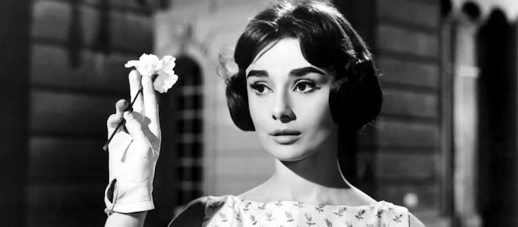 Can you name the iconic figure pictured right here?